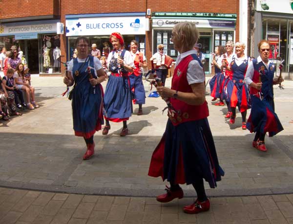 dancing in the busy high street in Bromsgrove