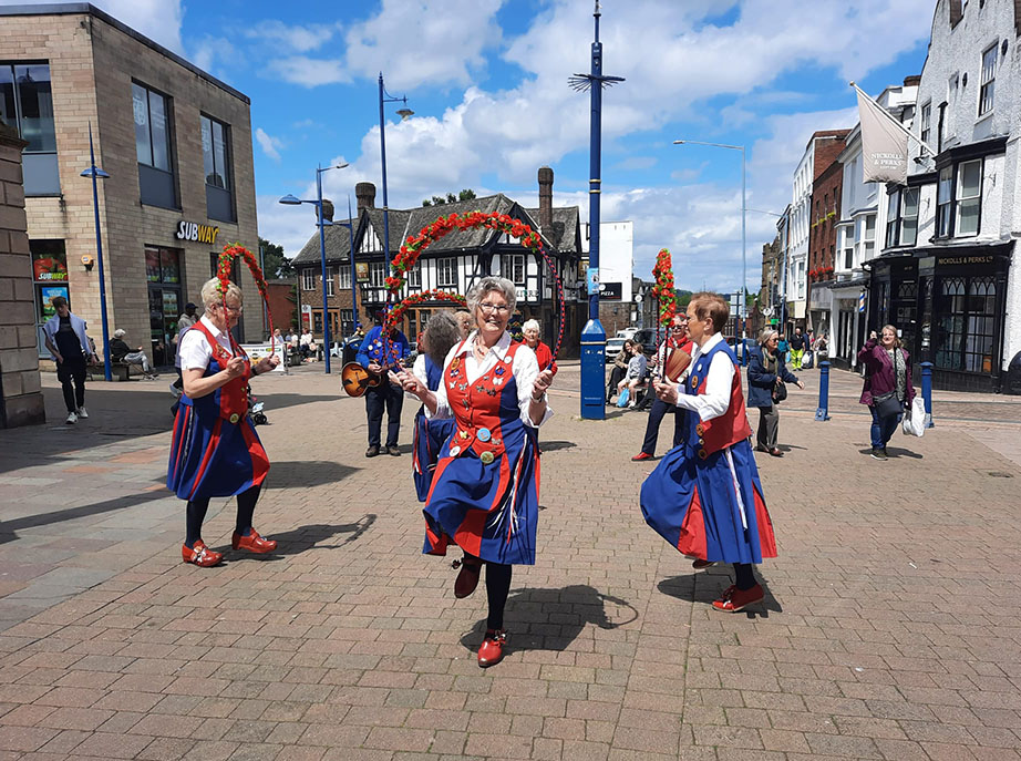 nancy butterfly dancing by the clock in Stourbridge, a main open space in the town centre