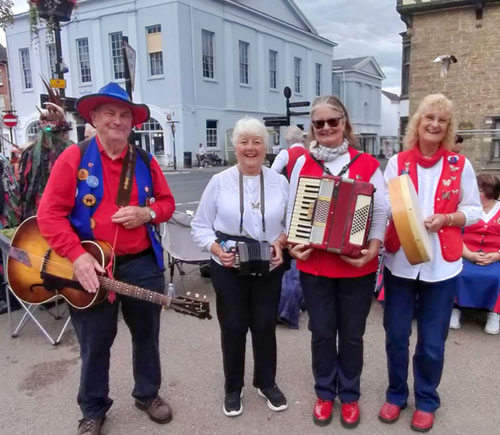 4 happy members of the band