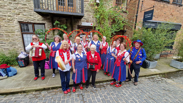 group photo of Nancy Butterfly dancers and musicians