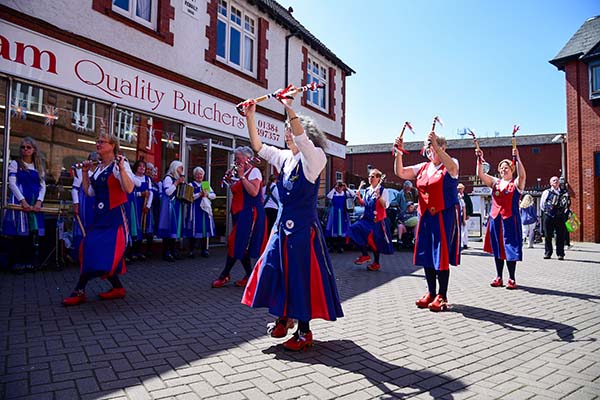 Dancing alongside the butchers window at Smithfield